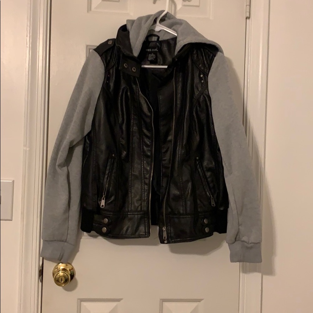 Leather jacket with sweatshirt sleeves